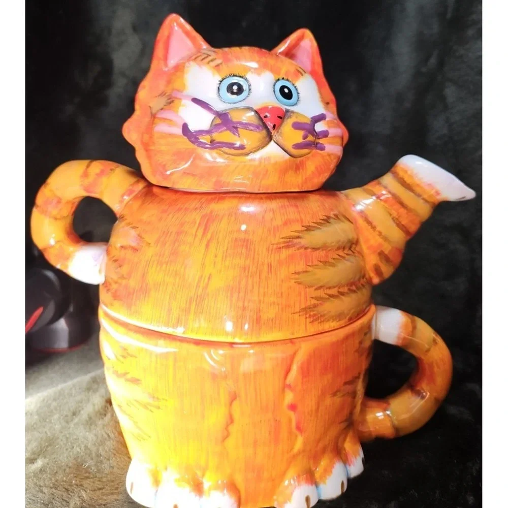 3 Piece‎ Teapot, Cat head as lid, Teapot, and Cup underneath. Unique